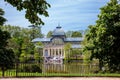 View of the beautiful Palacio de Cristal a conservatory located in El Retiro Park built in 1887 in