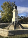 Madrid, Spain - November 10, 2017: Fallen angel statue placed on a fountain. Royalty Free Stock Photo