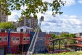 Firefighters climb a scale of a truck in one of the trainings in the fire station, in Madrid, Spain. Europe.