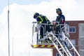 Firefighters climb a scale of a truck in one of the trainings in the fire station, in Madrid, Spain. Europe.