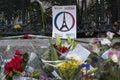 Madrid, Spain - November 15, 2015 - Flowers, candles and peace signs against terrorist attacks in Paris, in front of French Embass