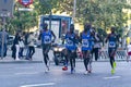 Professional athletes running the Movistar Half Marathon of Madrid through the most central streets of the capital of Spain. Royalty Free Stock Photo