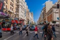 MADRID, SPAIN - OCTOBER 21, 2017: Pedestrans crossing Calle Gran Via street in Madri Royalty Free Stock Photo