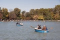 MADRID, SPAIN - OCTOBER 4, 2020: People enjoying a boat ride on the pond in El Retiro Park in Madrid