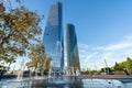 Water jets in front of the skyscrapers or Cuatro Torres in Madrid, Spain