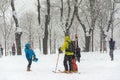 Madrid, Spain, 01.09.2021, People making foto of a ski man on the street Segovia, The storm Filomena