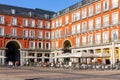 The Plaza Mayor, Town square, major public space in Madrid with three-story residential buildings, Spain. Royalty Free Stock Photo