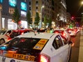 Car taxi traffic in downtown madrid gran via at night