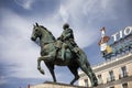 Madrid, Spain - September 17, 2022: Architecture of the buildings in the square of Door of the Sun and of the statue of Charles