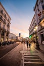 Scenic view of street in city centre of Madrid at sunset Royalty Free Stock Photo