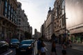 View of Gran Via street in the center of Madrid at sunrise, from the center of the street towards the Capitol building Royalty Free Stock Photo