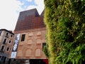 Madrid, Spain, 12.04.2022. Vertical garden and CaixaForum, a museum and cultural center in Paseo del Prado. Royalty Free Stock Photo