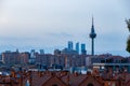 A view over the skyline during sunset of Madrid, with the business district quattro Torres seen from Las Siete Tetas at Tio Pio`s Royalty Free Stock Photo