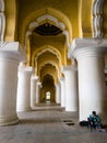 The ornately carved, colorful and decorated ceiling of the ancient Tirumalai Nayak Royalty Free Stock Photo