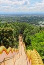 Mae Hia,Chiang Mai,Northern Thailand on Septemmber 13,2019:Golden colored Naga serpents guard the stairs on both sides of the