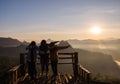 Mae Hong Son - Dec 16 2016 : Tourists women group standing poses on wooden terrace famous