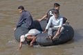 MAE SOT, THAILAND NOV 12TH: Burmese crossing the Moei river on a Royalty Free Stock Photo