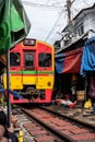 Maeklong Railway Market as Train is passing by Royalty Free Stock Photo