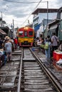 Maeklong Railway Market as Train is passing by Royalty Free Stock Photo