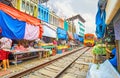 Maeklong Railway Market with riding train, Thailand Royalty Free Stock Photo