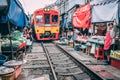 Maeklong railway market 12.13.2018nTourists visit the railway market outside bangkok and buy goods from the vendors. Royalty Free Stock Photo