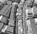 Maeklong, Thailand, panoramic downward aerial view of city buildings and famous railway market