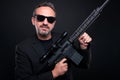 Mafia gangster showing his firearm Royalty Free Stock Photo