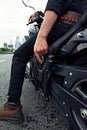 mafia man on bike with handgun. Sporty biker handsome rider male. Chase Royalty Free Stock Photo