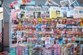 Magazine rack shelves filled with journals and newspaper in German, from an Austrian press reseller in downtown Vienna. Royalty Free Stock Photo