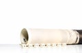 Magazine roll with wooden abc on white background Royalty Free Stock Photo