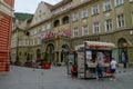 A magazine selling kiosk and the Coroana hotel behind it in Brasov.