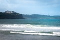 Magdalena Palace and Cabo Mayor lighthouse from El Puntal beach, Spain