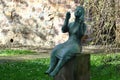 Magdeburg, Germany - April 14, 2024: A sitting girl, a 1958 sculpture by Werner Stoetzer in the sculpture park near the Magdeburg Royalty Free Stock Photo