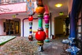 Magdeburg, Germany - 25 February 2019: Colorful building of Hundertwasser art with mosaic. A cafe corner in front of colons of