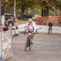 Magdeburg, Germany - 15 September 2019: Road bicycle racing. Female cyclist is near the finish line. Seniors are staying young by