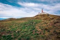 The Magellanic penguins with the Lighthouse of Magdalena Island background,