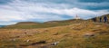 The Magellanic penguins with the Lighthouse of Magdalena Island background,