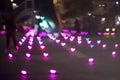 magenta bokeh and blur heart shape love valentine colorful night light on floor