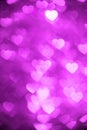 Magenta color heart bokeh background photo. Abstract holiday, celebration backdrop. Royalty Free Stock Photo