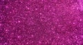 Magenta glitter texture background. Stars Sparkle Background, Vibrant bright glitter background. Royalty Free Stock Photo