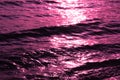 Magenta magical sea waves. Alien marvelous ocean.