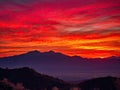 Magenta sunset over mountains