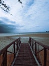 Magestic wooden bridge that leads to the ocean