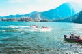Travelers enjoy the water by renting a speed boat