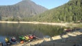 Magetan, Indonesia - June 14 2021:lake sarangan with the beautiful background of lawu mountain