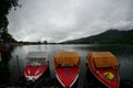 Three motorboats docked at the Sarangan Lake Royalty Free Stock Photo