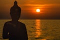 Magha Asanha Visakha Puja Day. Silhouette Buddha on blurred sunset background