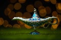 Magic Aladdin lamp of wishes on soft yellow lights background. Fairy tale concept