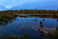 Magic arctic autumn in far russian north with lake and destroyed berth