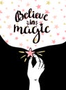 Magic background with stars and hand, inspiring phrase Believe in magic.